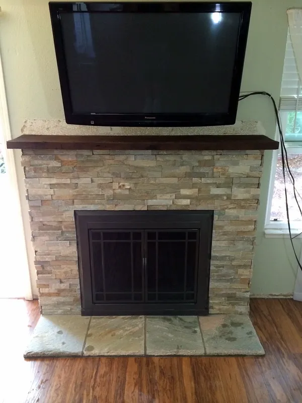 Stacked stone fireplace by Nick Lambdin Masonry
