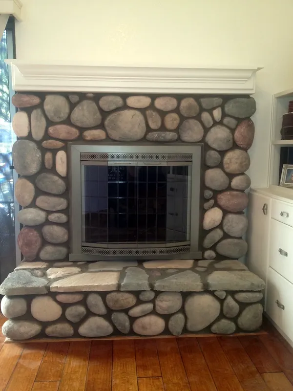 River rock fireplace by Nick Lambdin Masonry