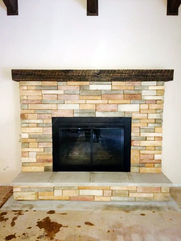 Stacked stone fireplace by Nick Lambdin Masonry