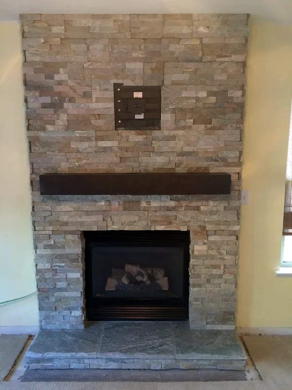 Stacked stone fireplace by Nick Lambdin Masonry
