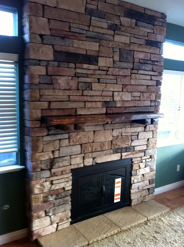 Stacked stone fireplace by Nick Lambdin Masonry