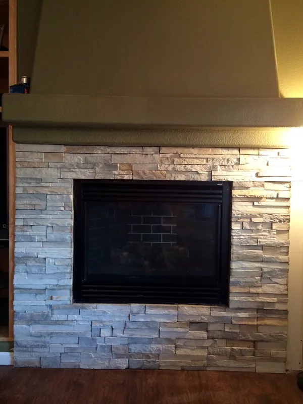Ledgestone fireplace by Nick Lambdin Masonry