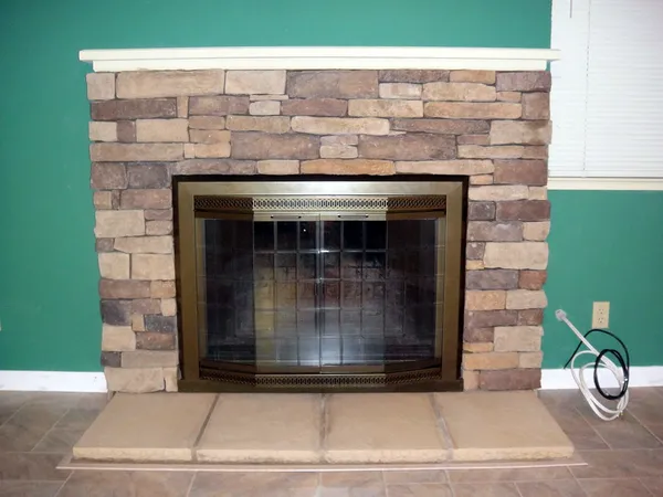 Stacked stone fireplace by Nick Lambdin Masonry
