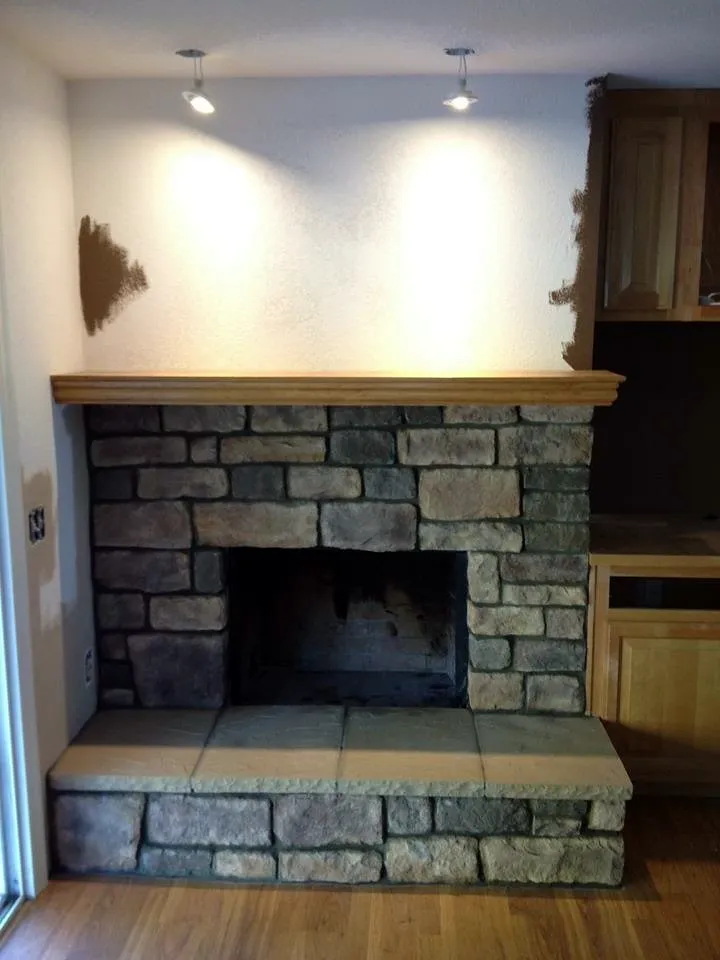 Stacked stone fireplace by Nick Lambdin Masonry