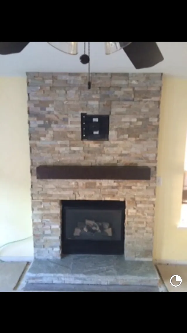 Ledgestone fireplace by Nick Lambdin Masonry