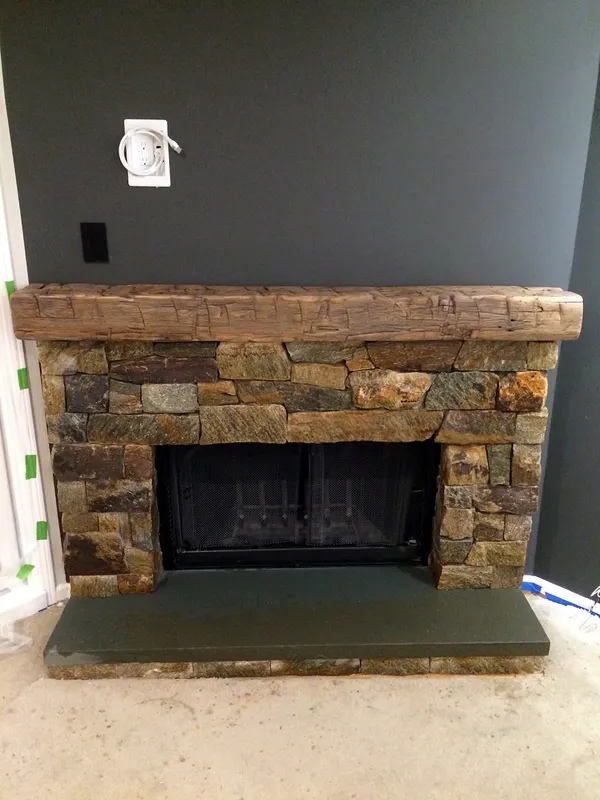 Stone fireplace by Nick Lambdin Masonry