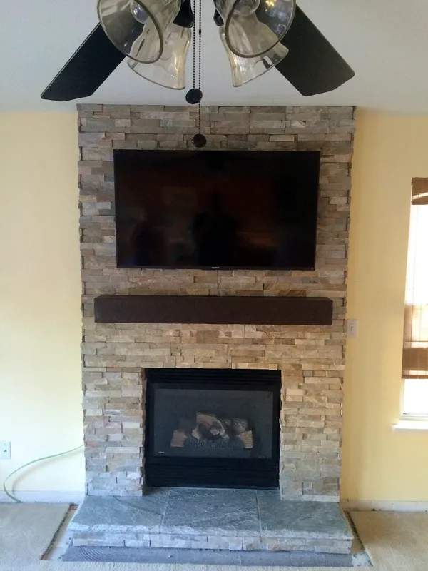 Stone fireplace by Nick Lambdin Masonry