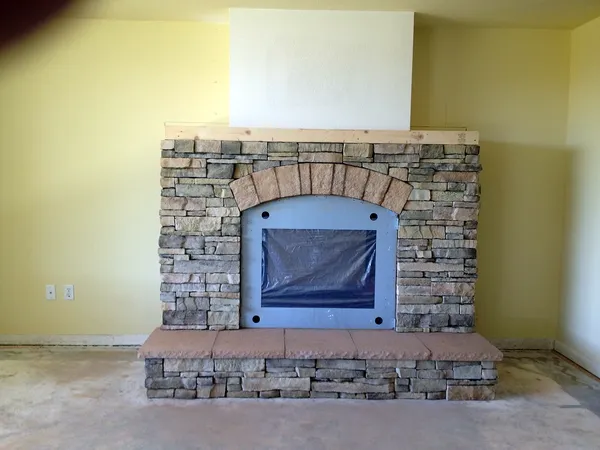 Stone fireplace by Nick Lambdin Masonry