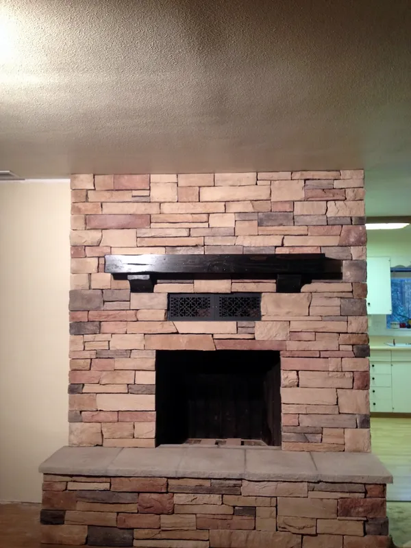 Ledgestone fireplace by Nick Lambdin Masonry