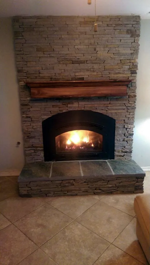 Ledgestone fireplace by Nick Lambdin Masonry