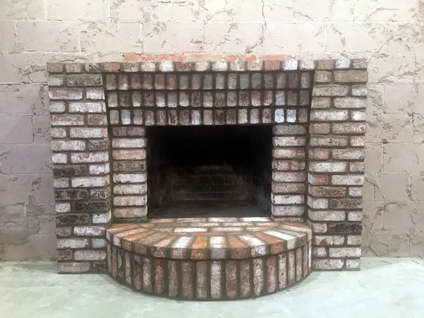 Brick fireplace by Nick Lambdin Masonry