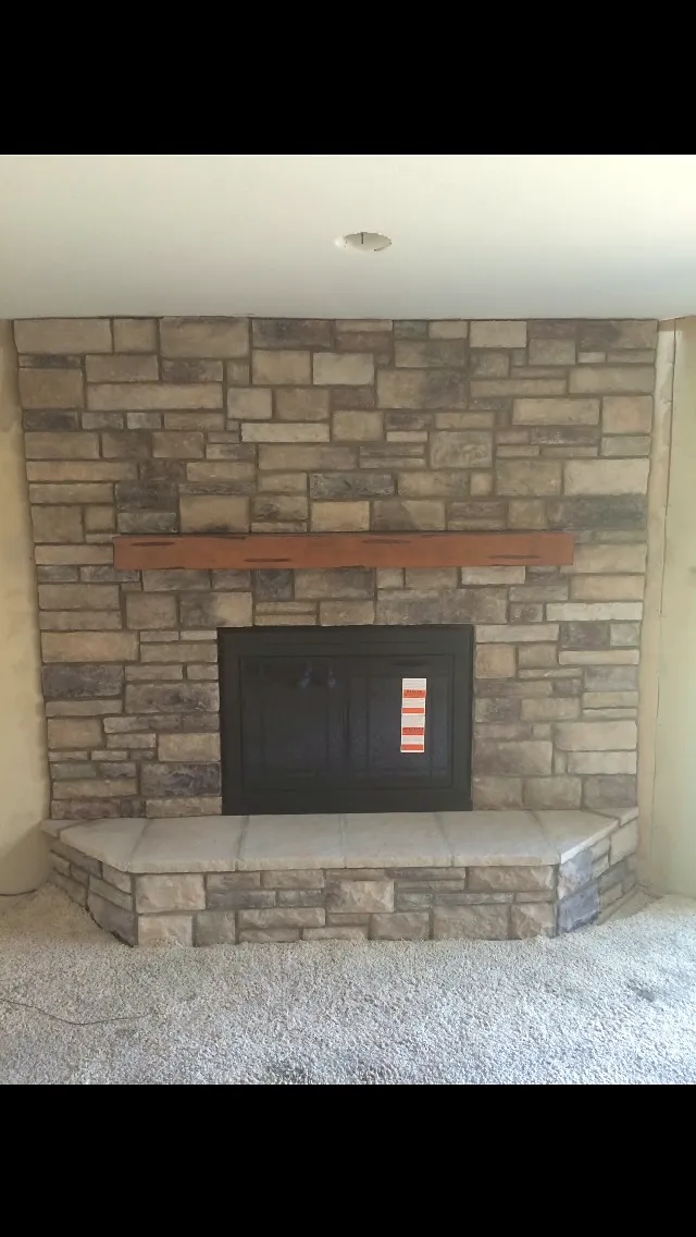 Ledgestone fireplace by Nick Lambdin Masonry