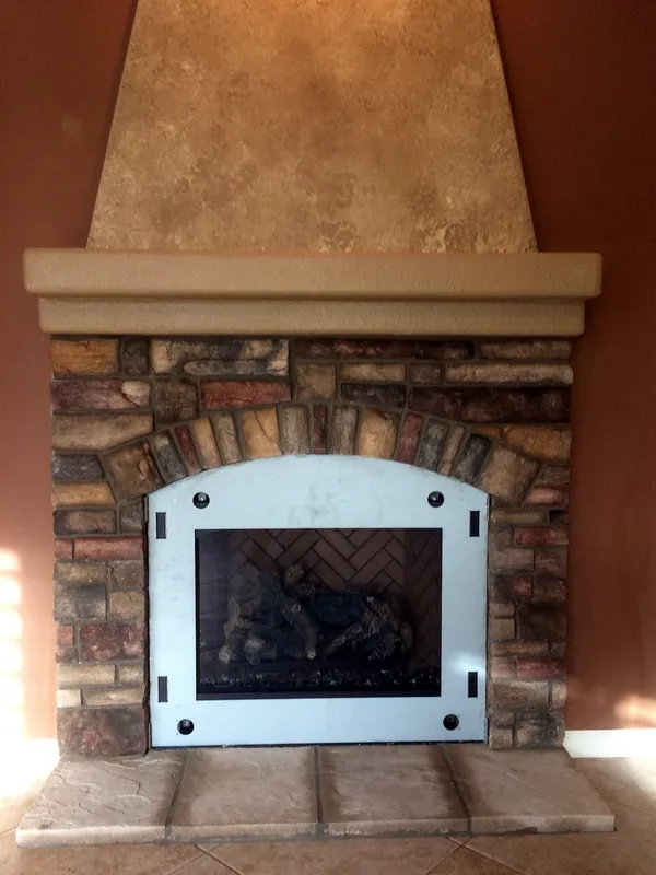 Stone & plaster hood by Nick Lambdin Masonry