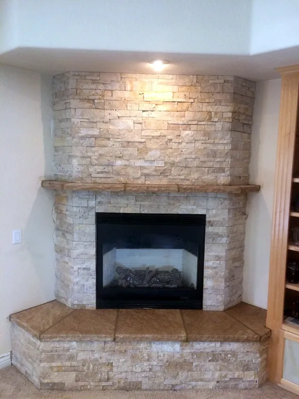 Ledgestone fireplace by Nick Lambdin Masonry