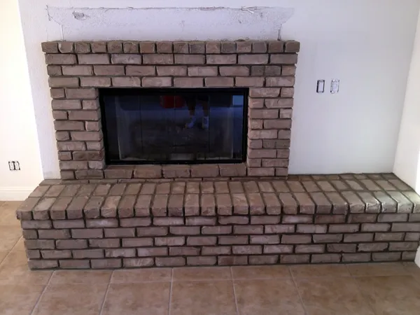 Brick fireplace by Nick Lambdin Masonry