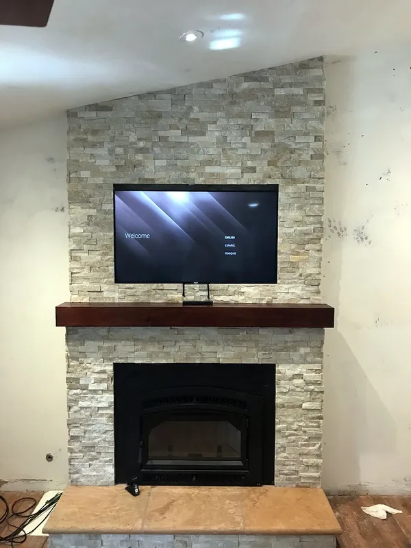 Ledgestone fireplace by Nick Lambdin Masonry
