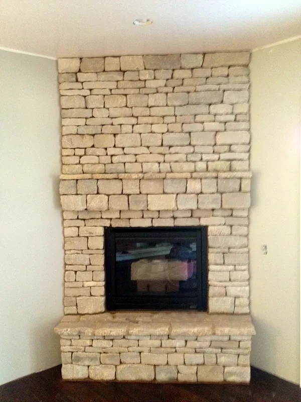 Ledgestone fireplace by Nick Lambdin Masonry