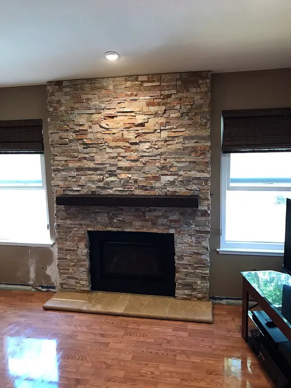 Ledgestone fireplace by Nick Lambdin Masonry