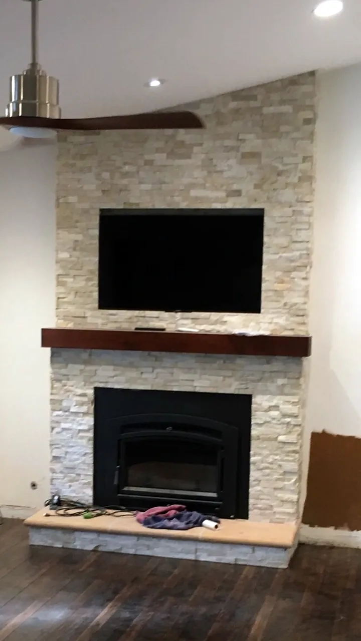Ledgestone fireplace by Nick Lambdin Masonry