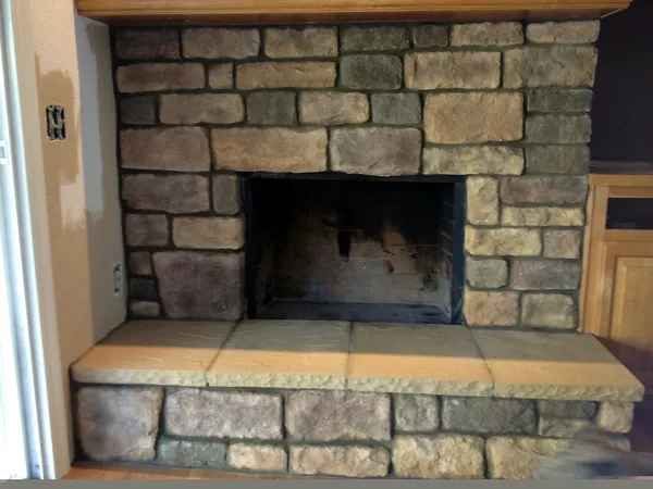 Stacked stone fireplace by Nick Lambdin Masonry