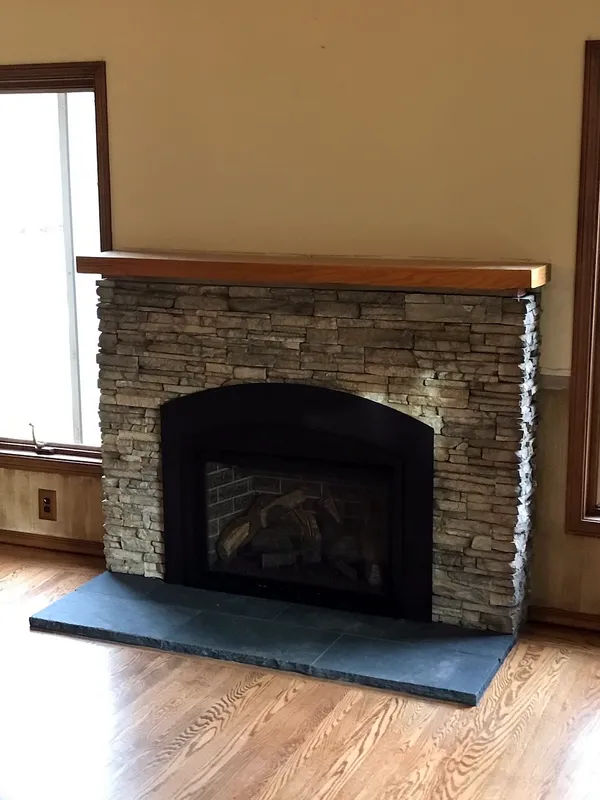 Ledgestone fireplace by Nick Lambdin Masonry