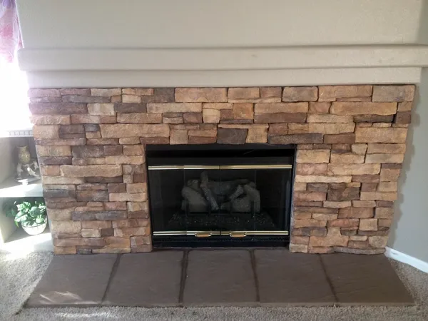 Ledgestone fireplace by Nick Lambdin Masonry