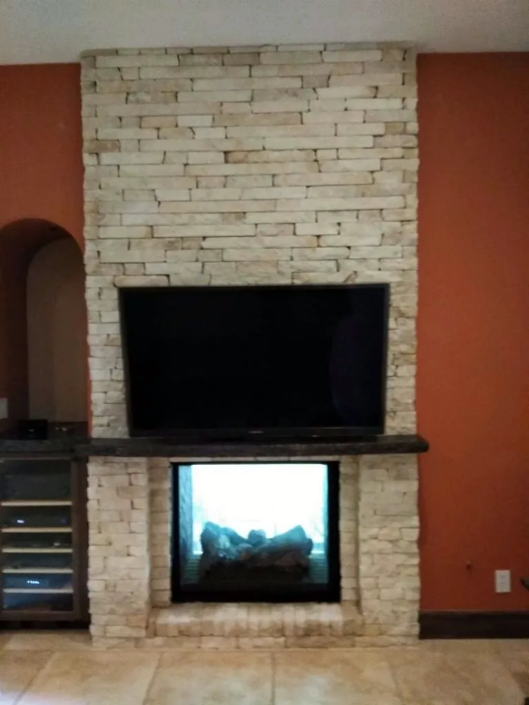 Ledgestone fireplace by Nick Lambdin Masonry