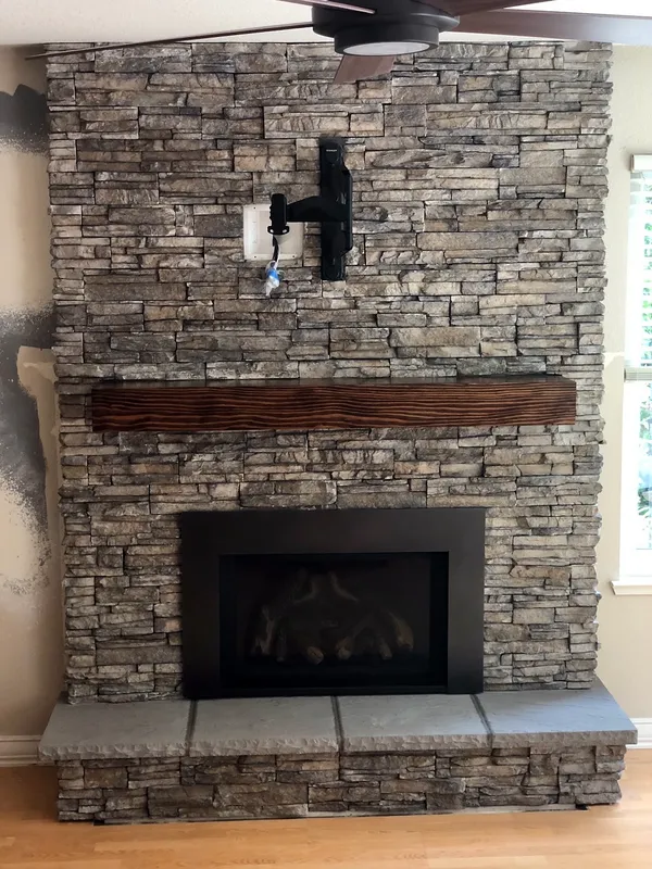 Ledgestone fireplace by Nick Lambdin Masonry
