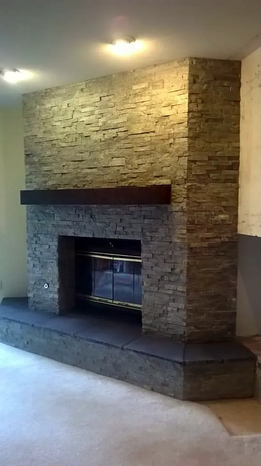 Ledgestone fireplace by Nick Lambdin Masonry