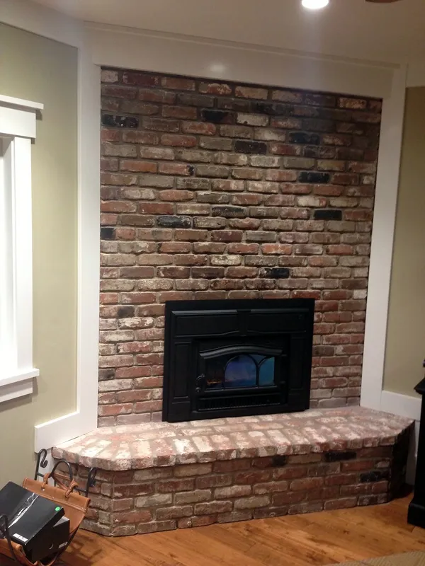 Brick fireplace by Nick Lambdin Masonry