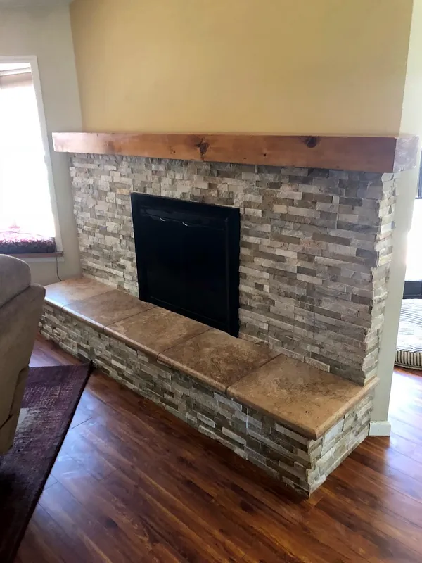 Ledgestone fireplace by Nick Lambdin Masonry