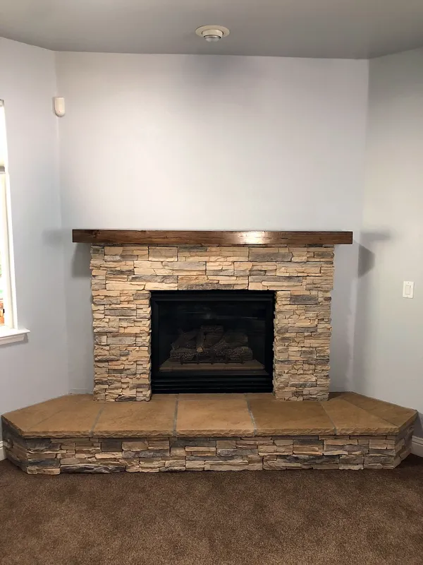 Ledgestone fireplace by Nick Lambdin Masonry