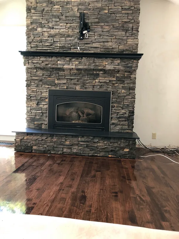 Ledgestone fireplace by Nick Lambdin Masonry