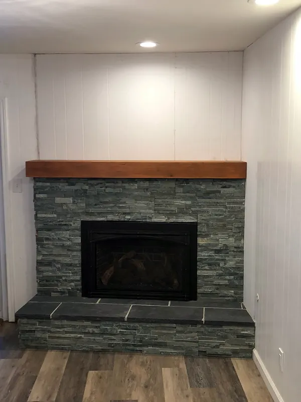 Slate ledgestone fireplace by Nick Lambdin Masonry