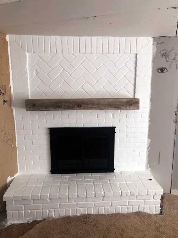 Brick & mantel by Nick Lambdin Masonry