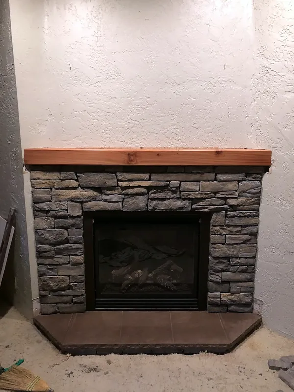 Ledgestone fireplace by Nick Lambdin Masonry