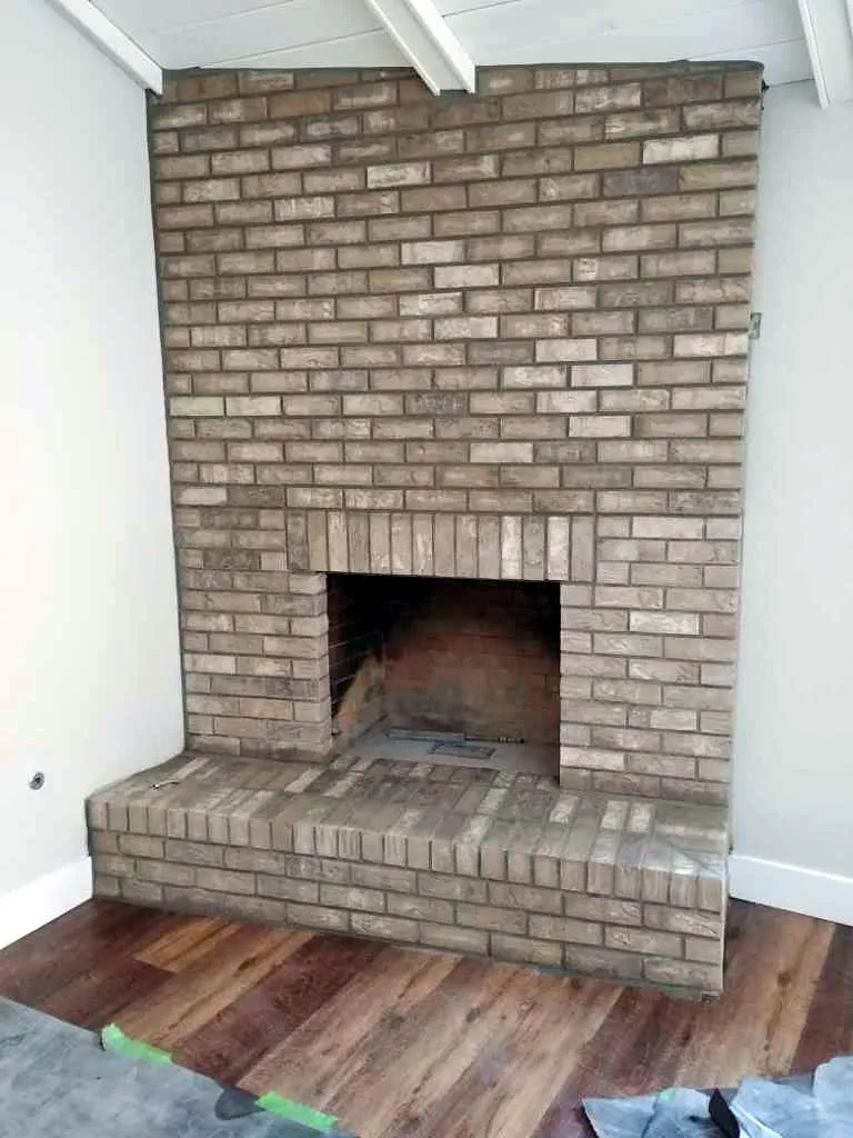 Brick fireplace by Nick Lambdin Masonry