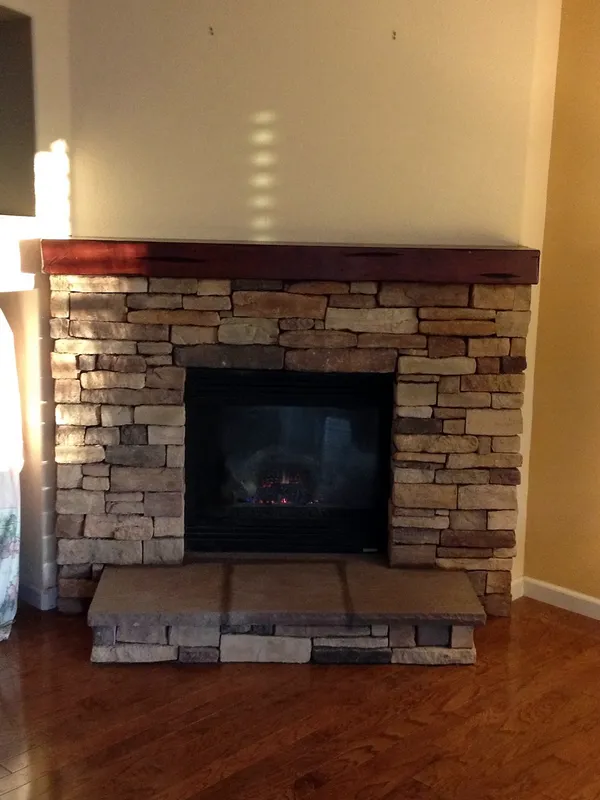 Stacked stone fireplace by Nick Lambdin Masonry