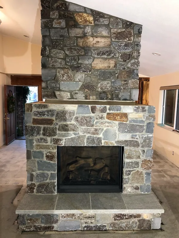 Natural stone fireplace by Nick Lambdin Masonry