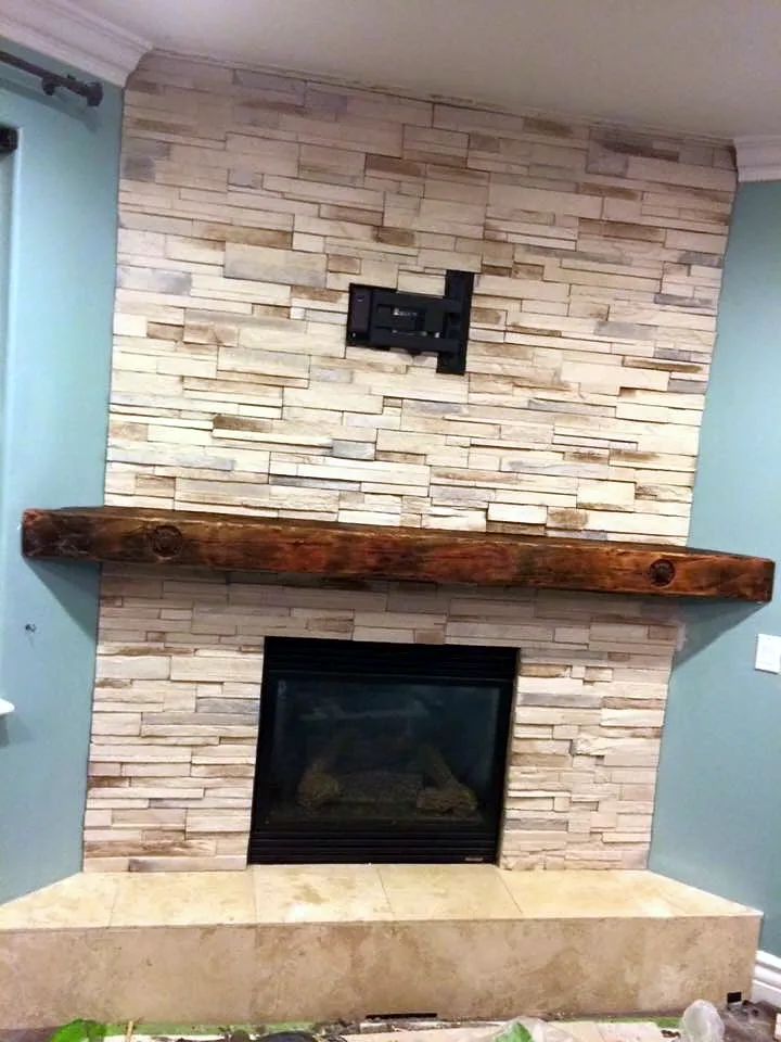 Stacked stone fireplace by Nick Lambdin Masonry