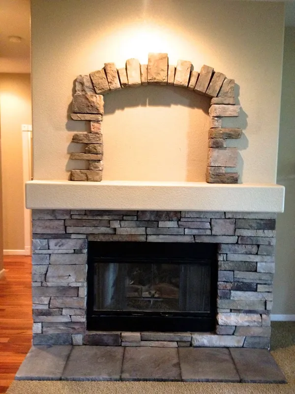 Stacked stone fireplace by Nick Lambdin Masonry