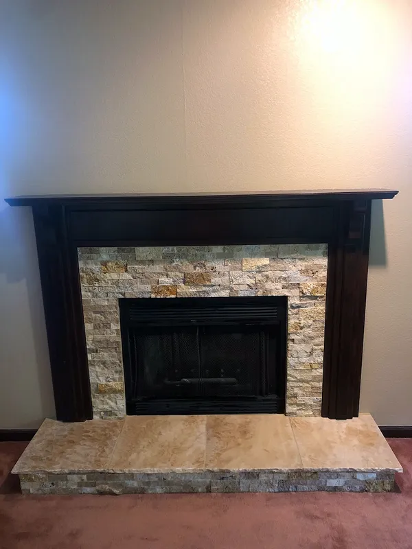 Ledgestone fireplace by Nick Lambdin Masonry