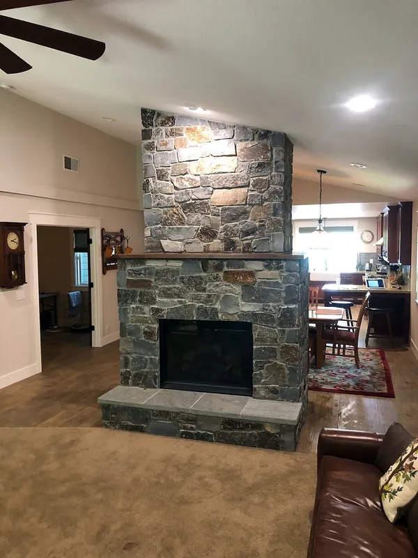 Natural stone fireplace by Nick Lambdin Masonry