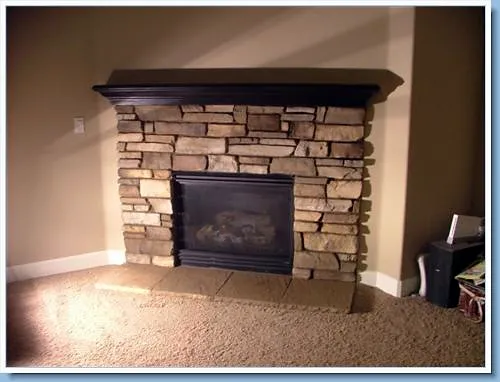 Stacked stone fireplace by Nick Lambdin Masonry
