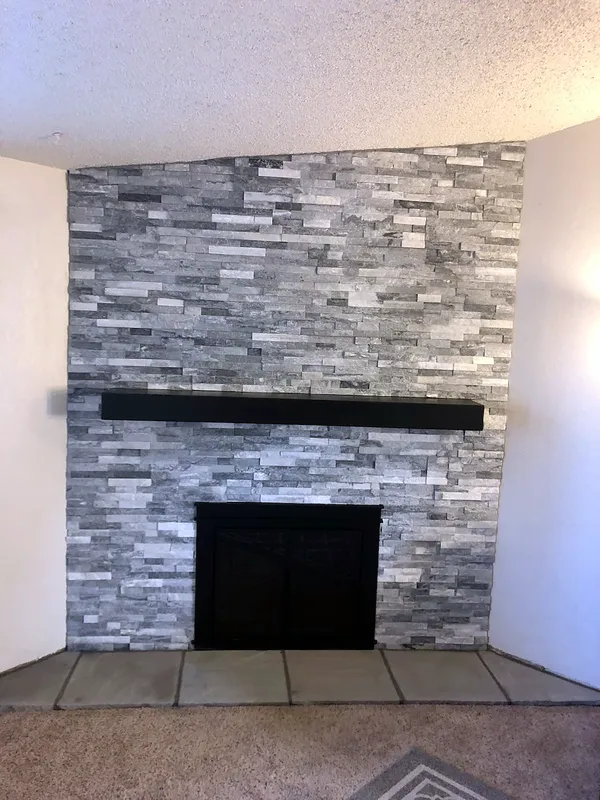 Ledgestone fireplace by Nick Lambdin Masonry