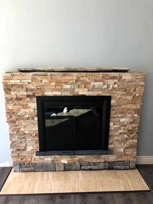 Stacked stone fireplace by Nick Lambdin Masonry