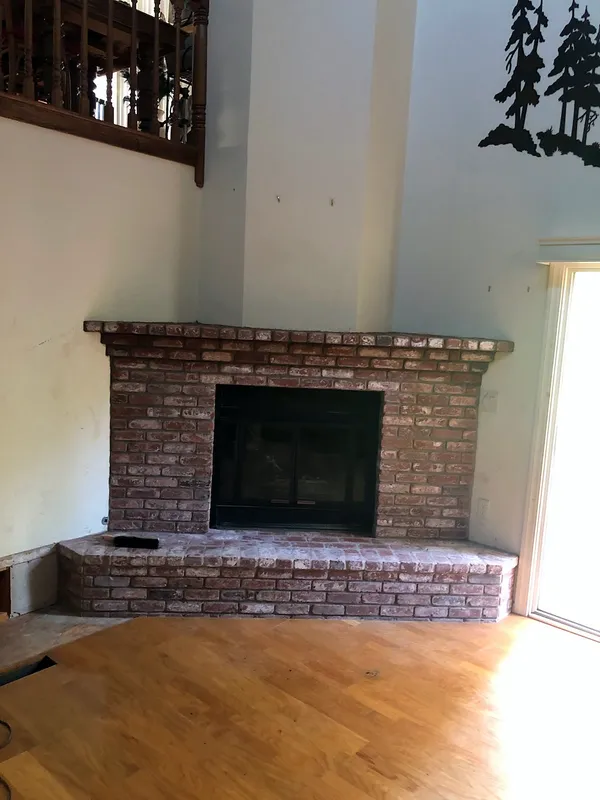 Brick fireplace by Nick Lambdin Masonry
