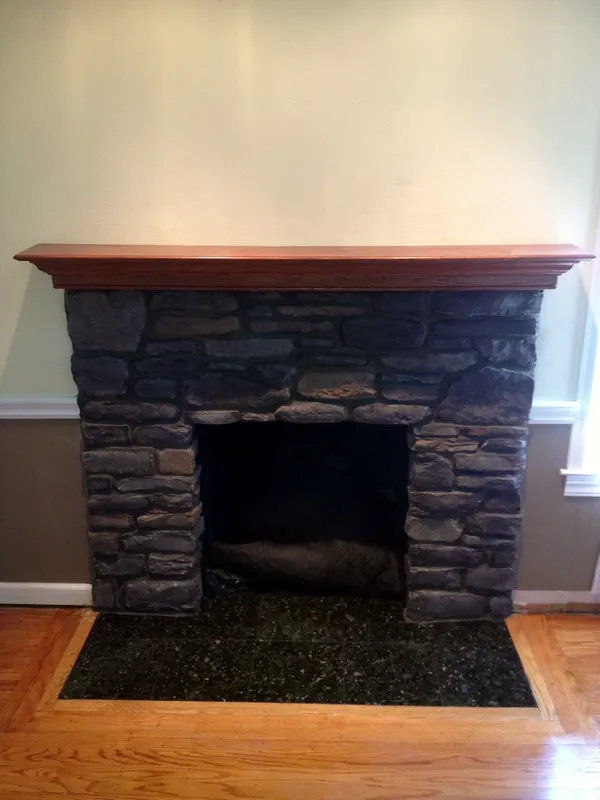 Stacked stone fireplace by Nick Lambdin Masonry