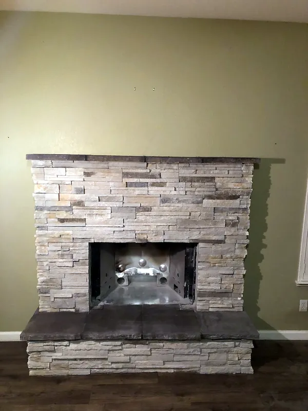 Stacked stone fireplace by Nick Lambdin Masonry
