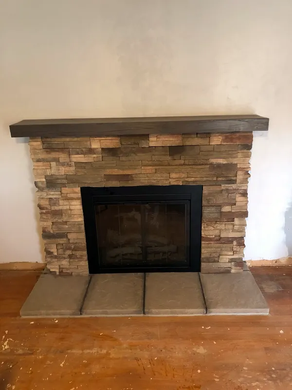 Stacked stone fireplace by Nick Lambdin Masonry